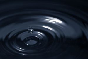 Drop of water in water